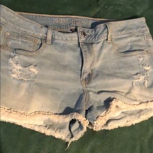 Woman’s jeans with cuts shorts